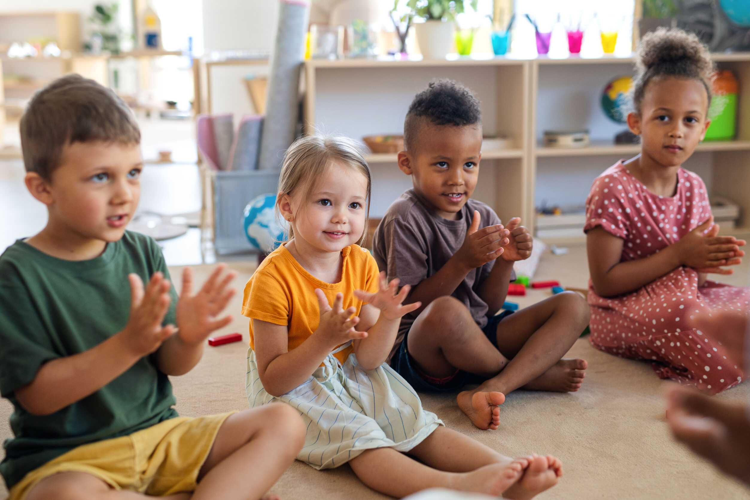 Toddlers being socialized by an ECE teacher